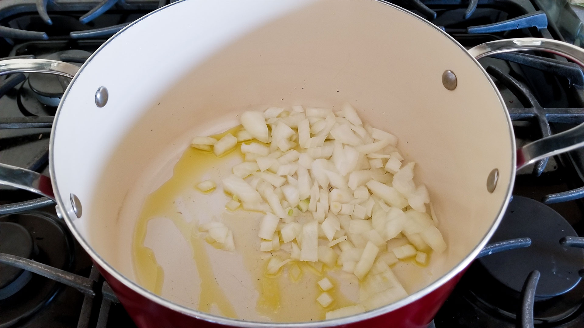 Olive oil and diced onion in a stockpot