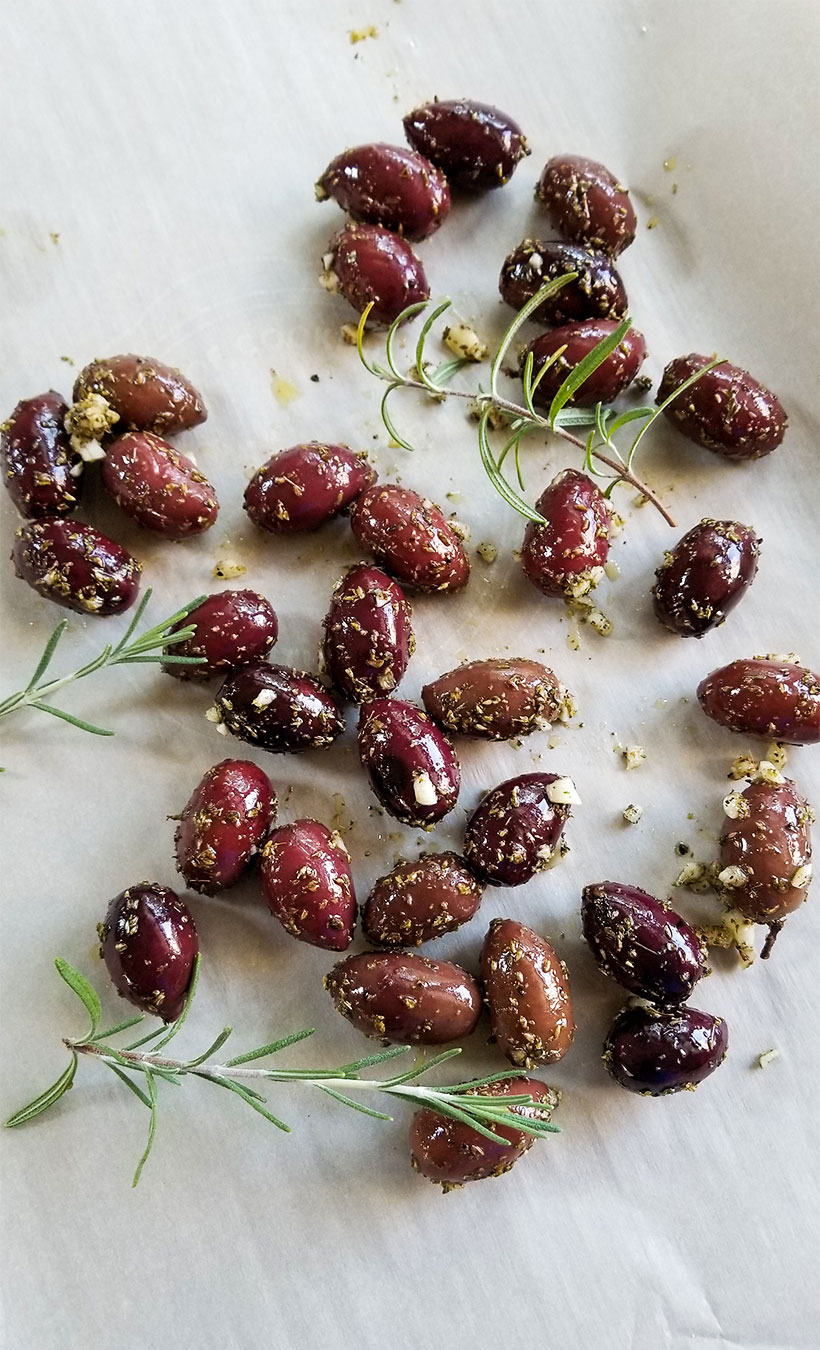 kalamata olives with olive oul and herbs and spices