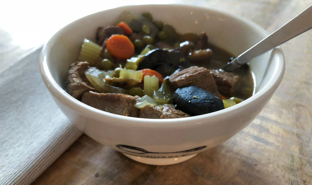  Crockpot Low Carb Beef Stew in a bowl with a spoon