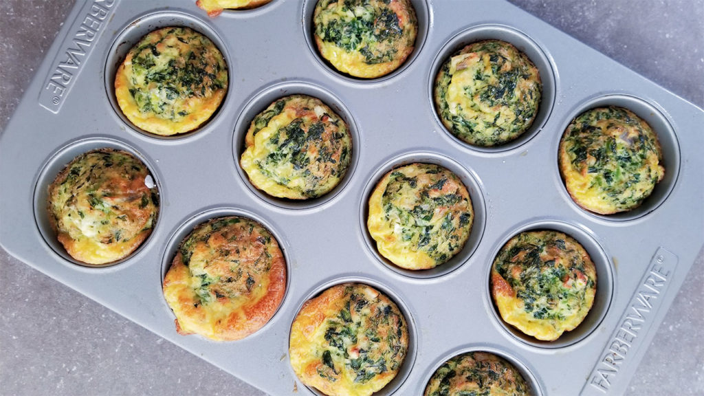 Spanakopita Egg Cups in a muffin tin