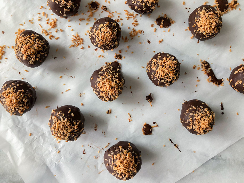 Samoas Truffles sprinkled with toasted coconut