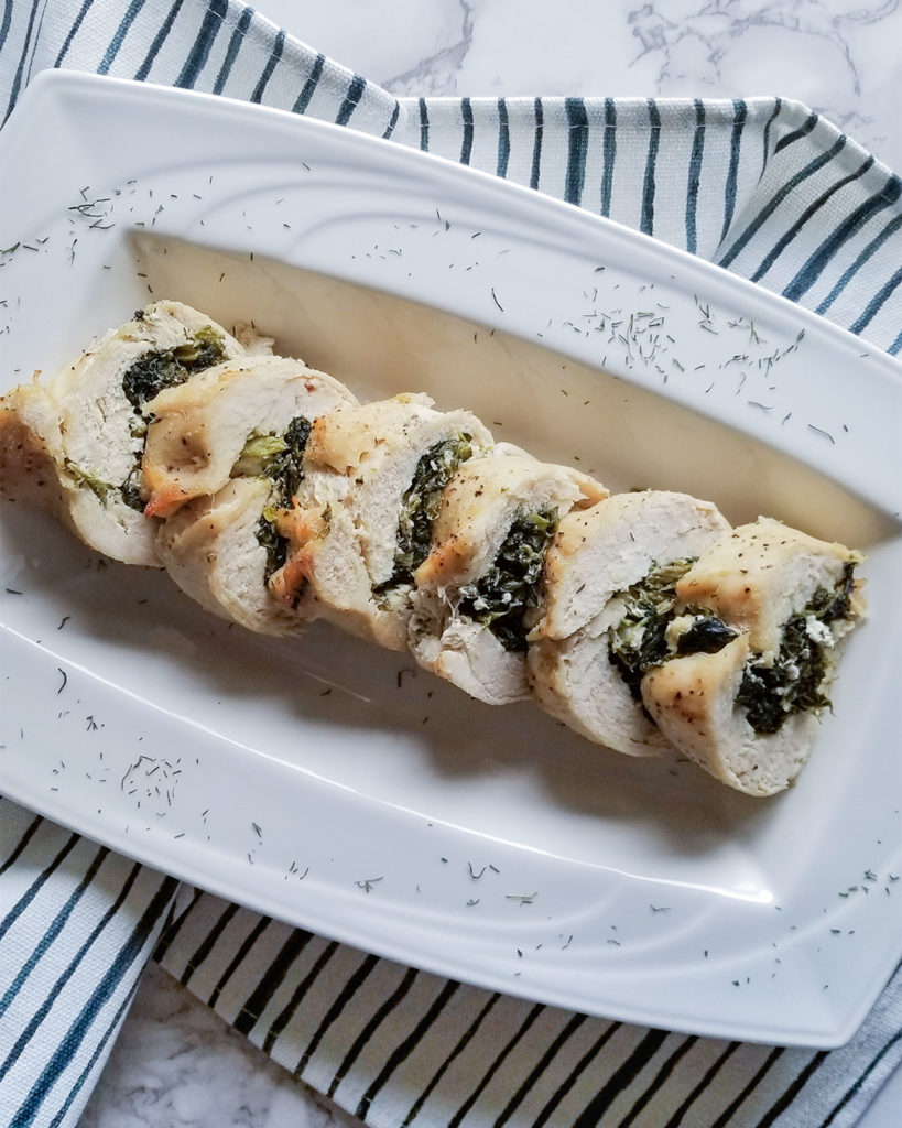 Spanakopita Stuffed Chicken on a serving plate