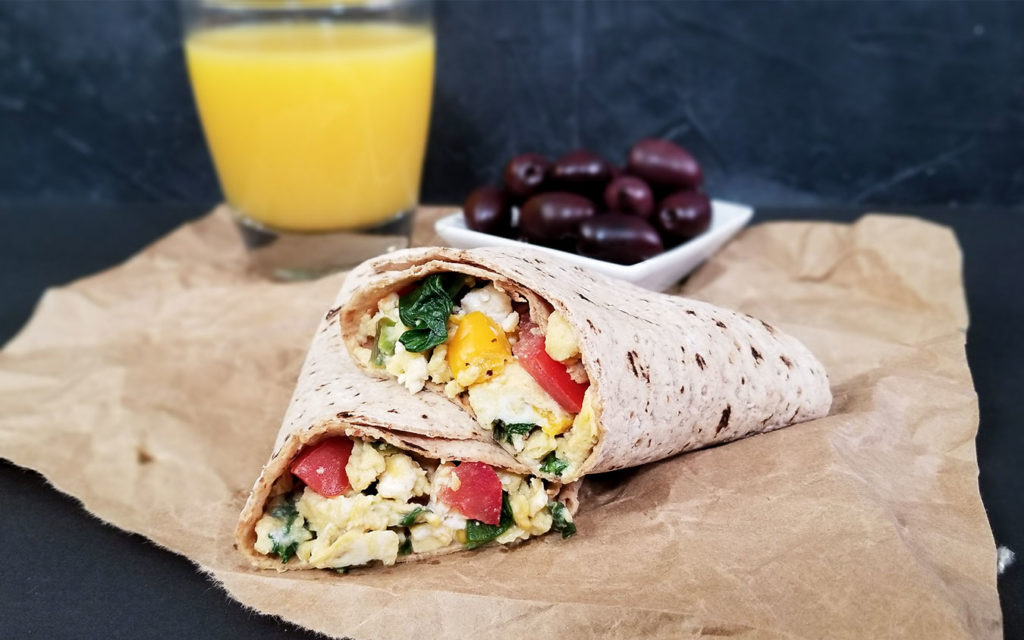 Greek Breakfast Wraps with orange juice and Kalamata olives