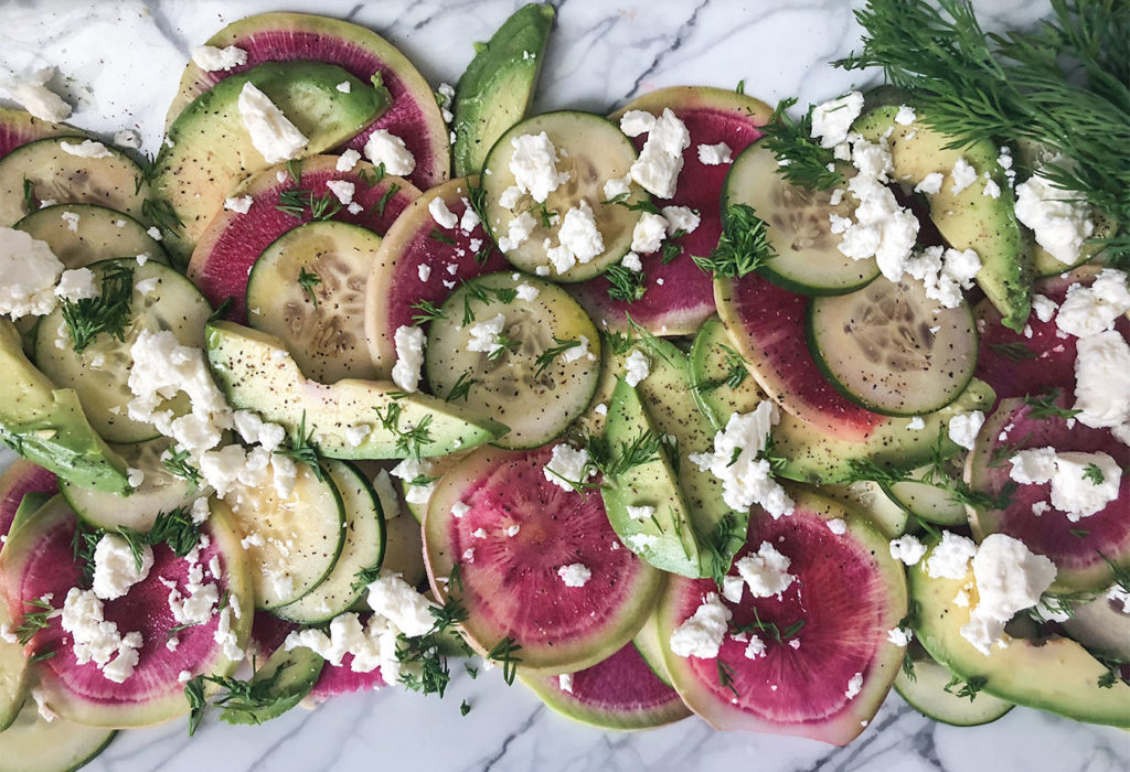 Watermelon Radish Salad topped with dill and feta cheese