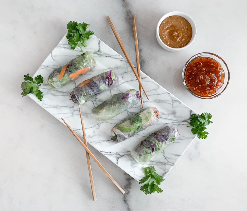 Vegetable Summer Rolls on a plate with dipping sauces