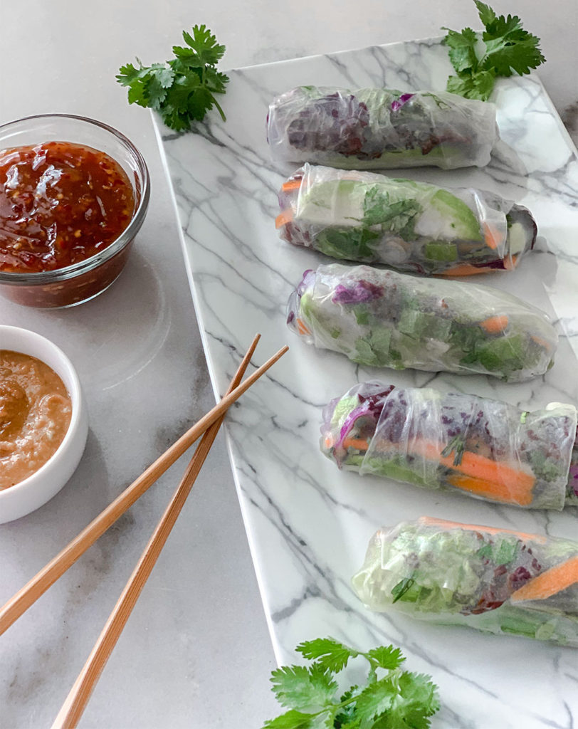 Vegetable Summer Rolls on a plate with dipping sauces