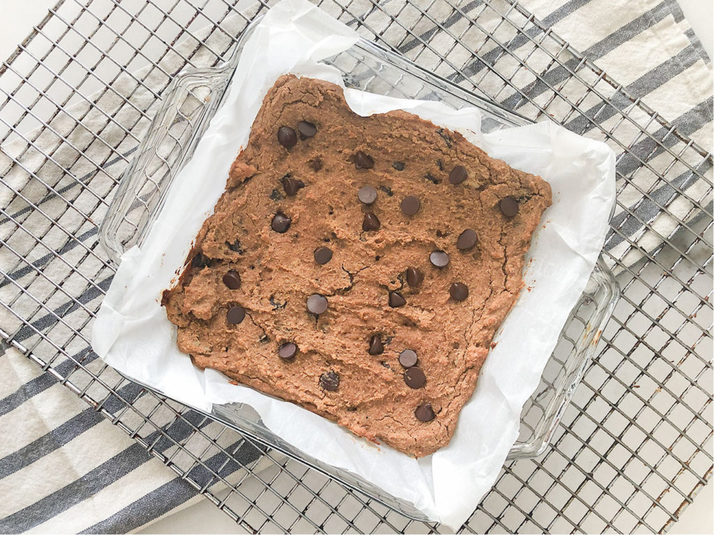 Chickpea Blondies in a baking dish on a cooling rack