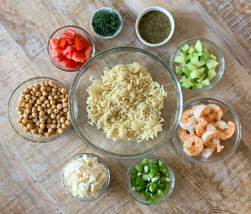 Mediterranean Shrimp & Orzo Salad ingredients in individual bowls