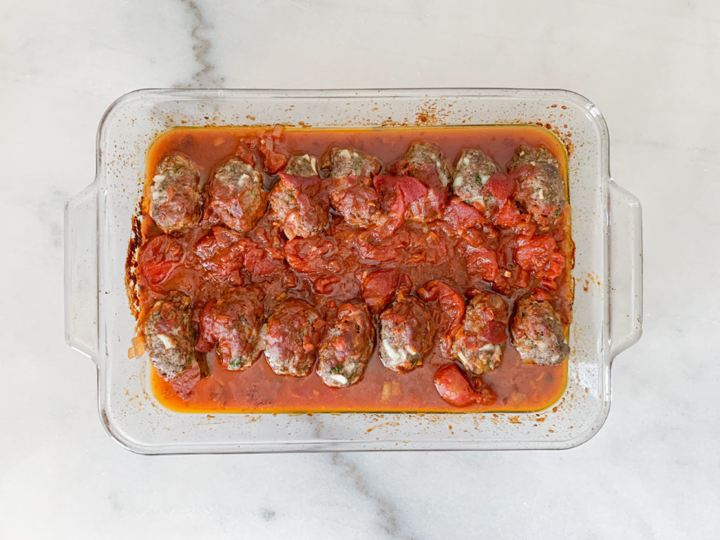 Baked meatballs covered in the tomato sauce
