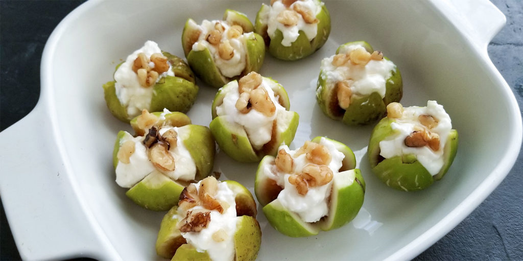 figs stuffed and in a baking dish