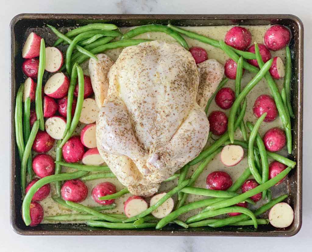 Whole Chicken topped with a lemon marinade with red potatoes and green beans