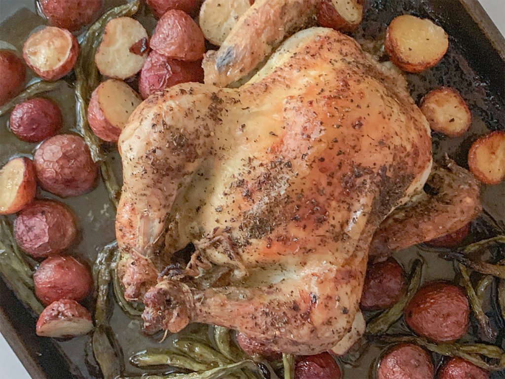 Whole Roasted Greek Lemon Chicken with red potatoes and green beans