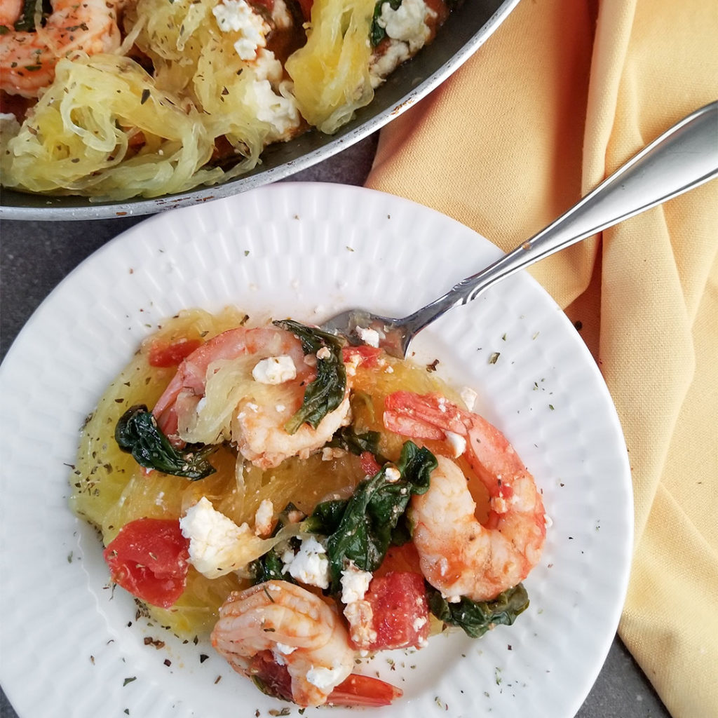 Mediterranean Spaghetti Squash with Shrimp on a plate