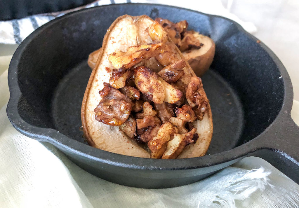 baklava stuffed pears in a castiron skillet