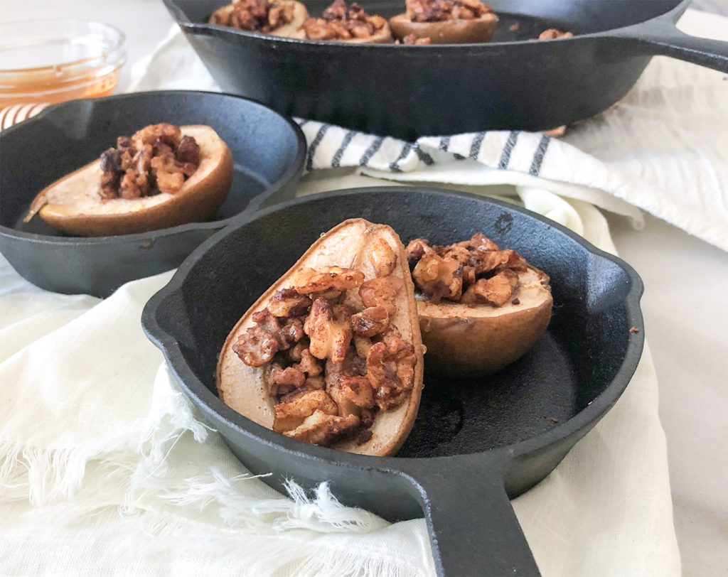 baklava stuffed pears in a castiron skillet