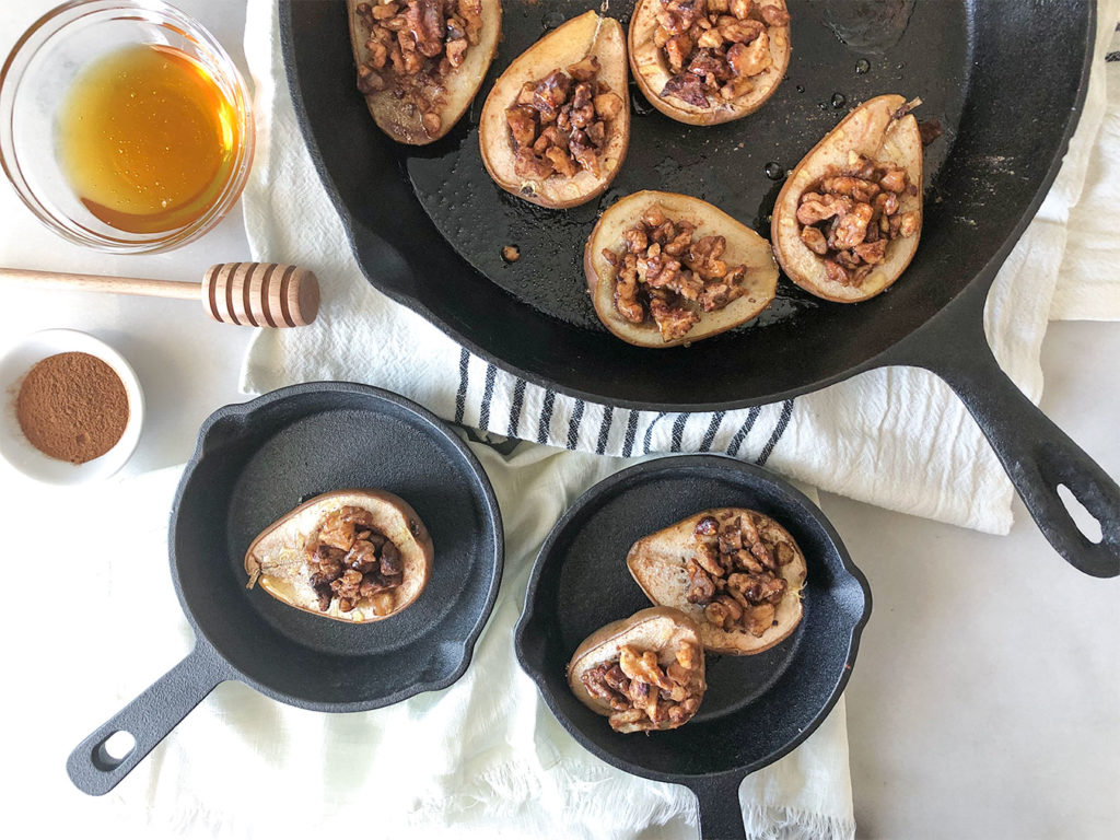 baklava stuffed pears in a castiron skillet