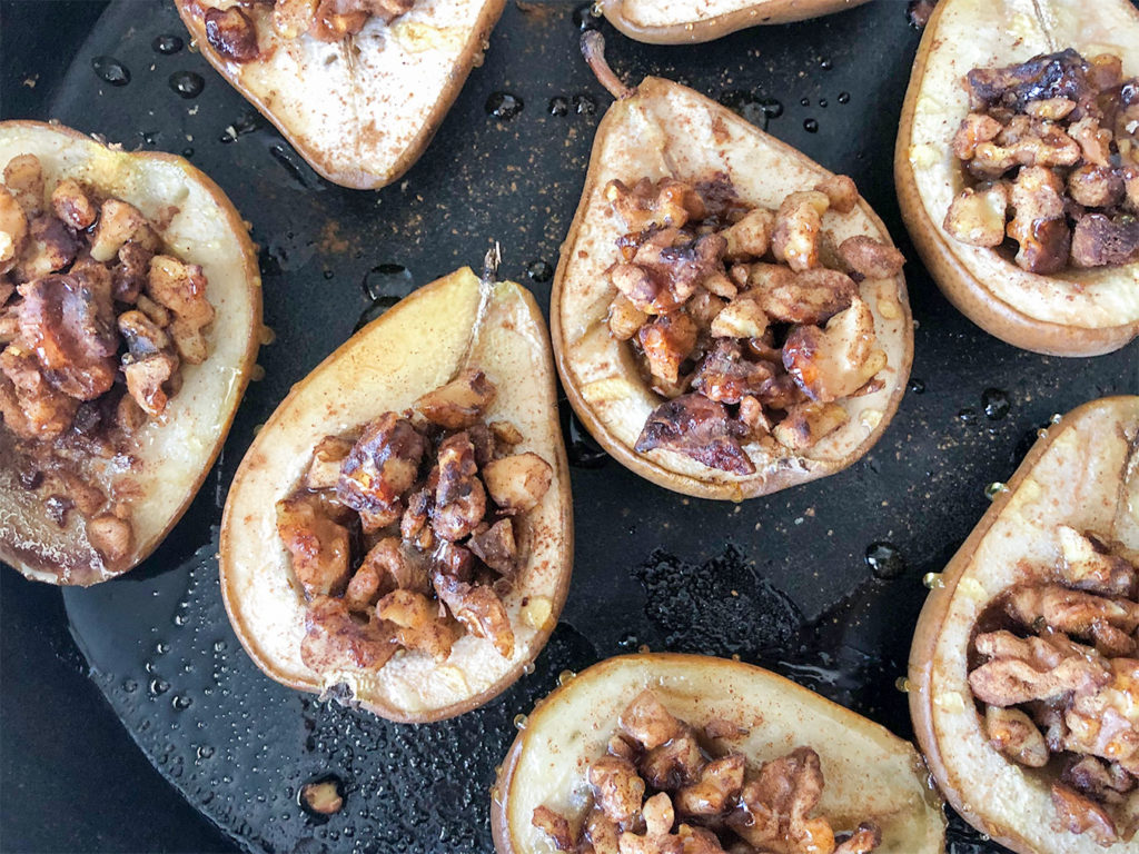 baklava stuffed pears in a castiron skillet