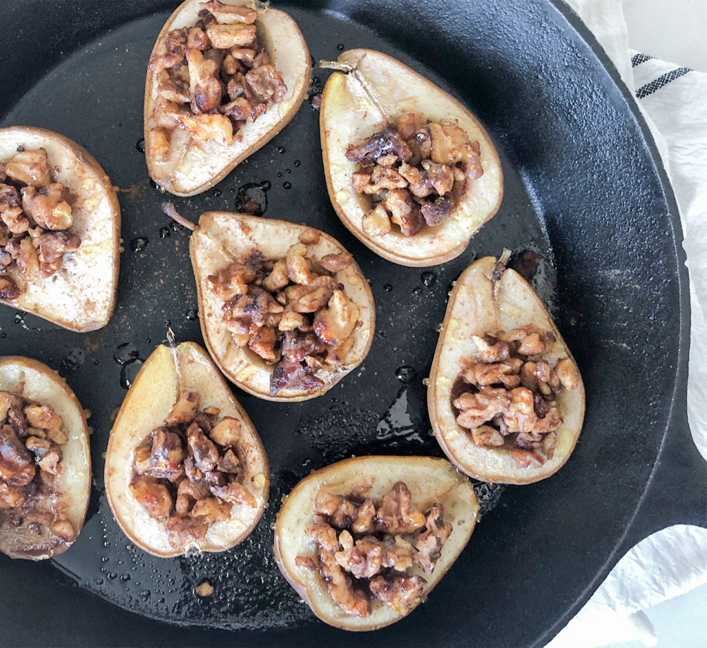 baklava stuffed pears in a castiron skillet