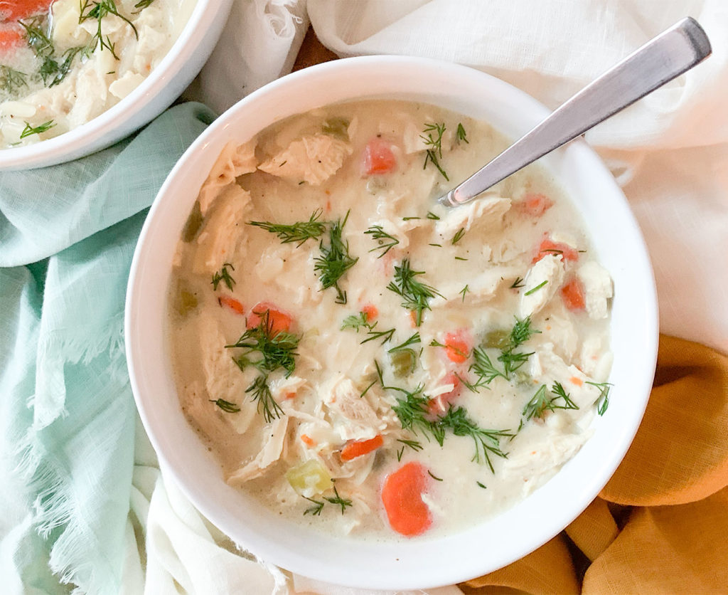 Avgolemono - Greek Lemon Chicken Soup in serving bowls