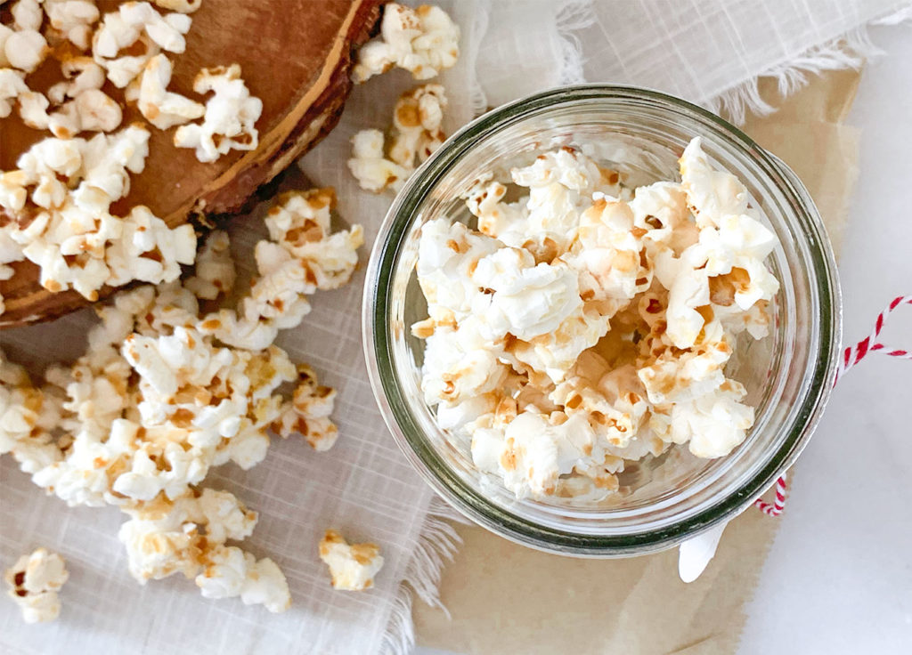 Caramel Popcorn on a platter and in a jar