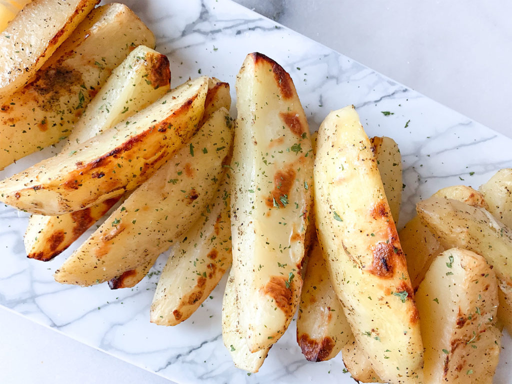 Greek lemon potatoes on a serving plate