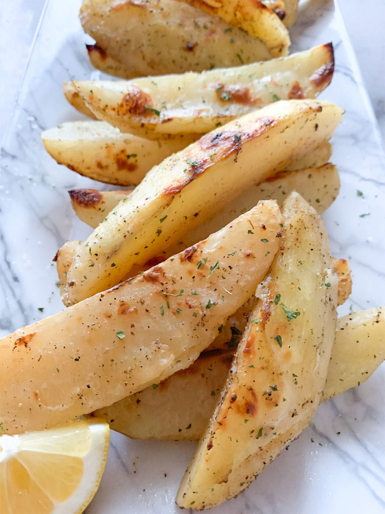 Greek lemon potatoes on a serving plate