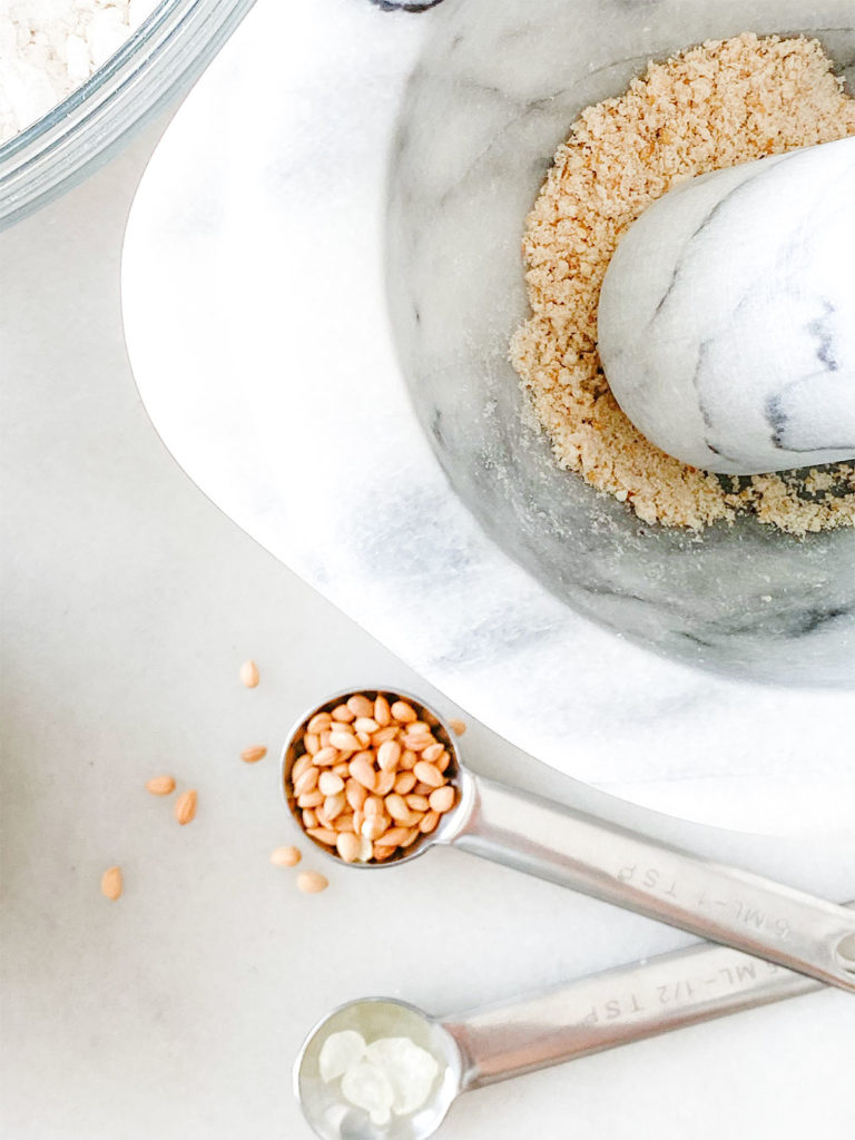 malhelp seeds, mastiha and sugar ground in a mortar and pestle.