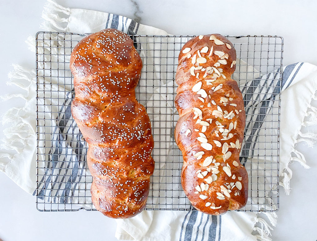 tsoureki greek sweet bread fresh out of the oven cooling on a cooling rack