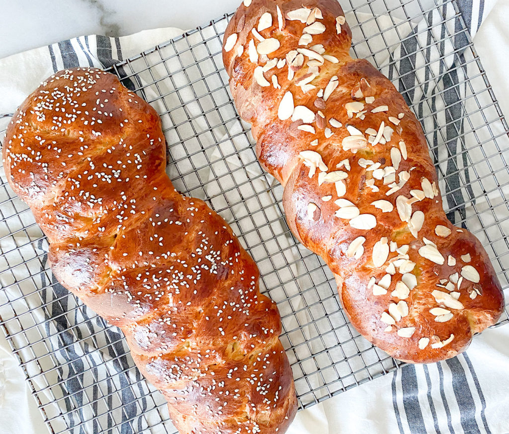 tsoureki greek sweet bread fresh out of the oven cooling on a cooling rack