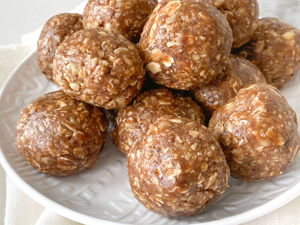 No-Bake Baklava Protein Balls stacked on a plate