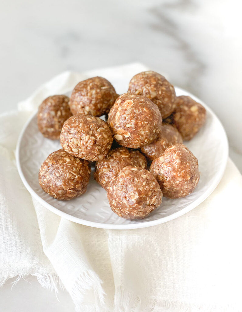 No-Bake Baklava Protein Balls stacked on a plate