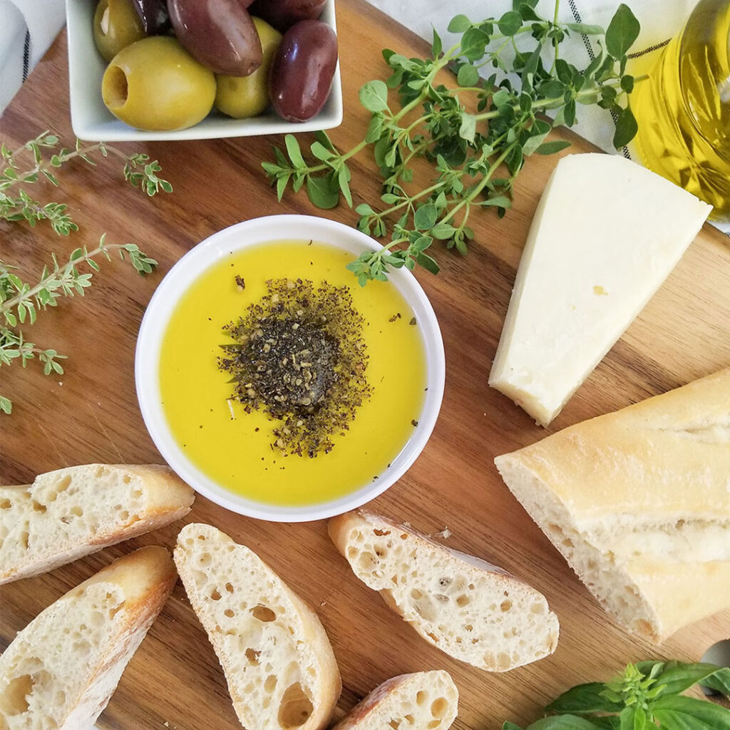 https://www.hearthealthygreek.com/wp-content/uploads/2020/08/Olive-Oil-Dipping-Sauce-square-1-1024x1024.jpg