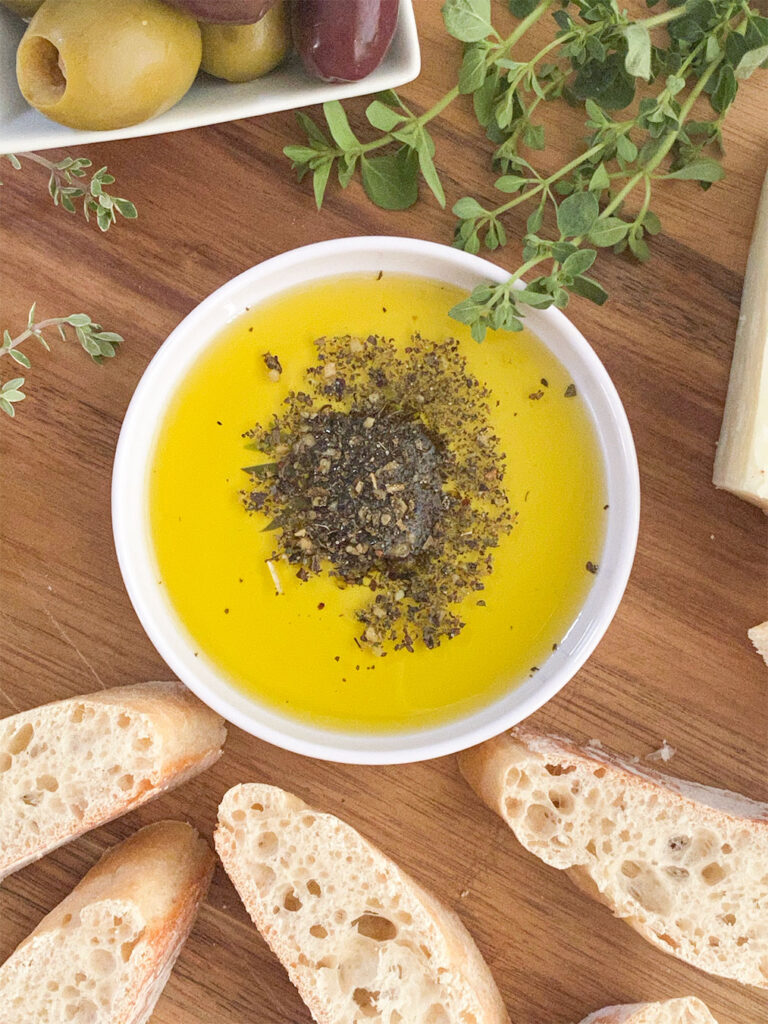 https://www.hearthealthygreek.com/wp-content/uploads/2020/08/Olive-Oil-Dipping-Sauce6-768x1024.jpg