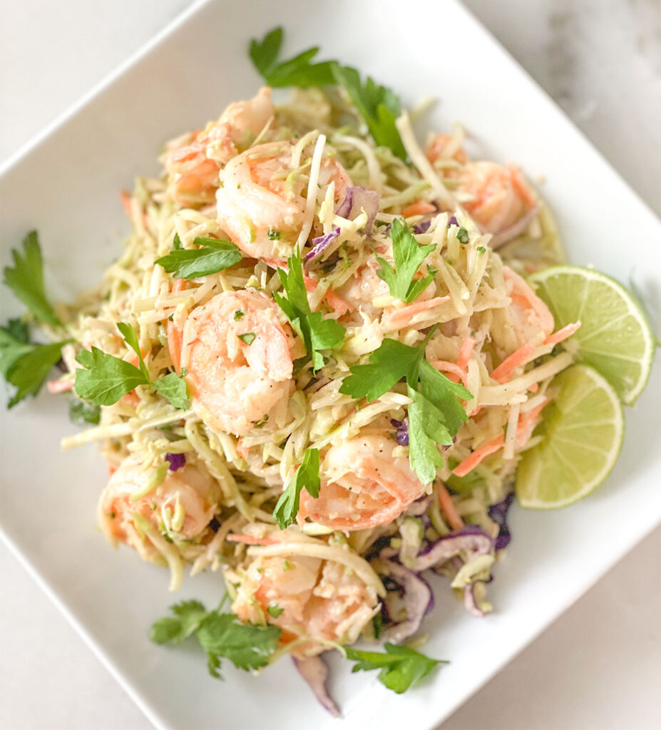 broccoli slaw salad with sautéed shrimp and bang bang sauce