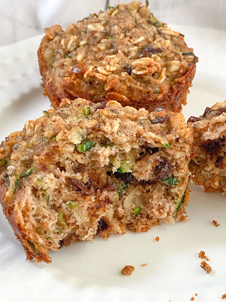 A zucchini muffin cut in half