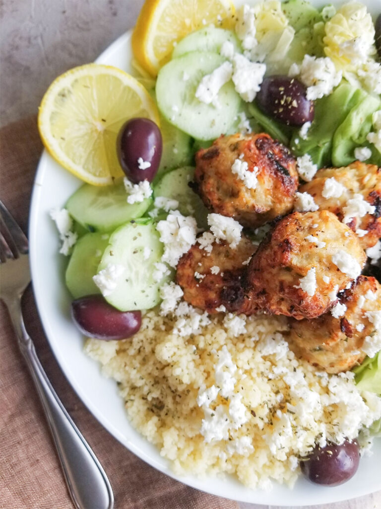 chicken meatballs with couscous and salad