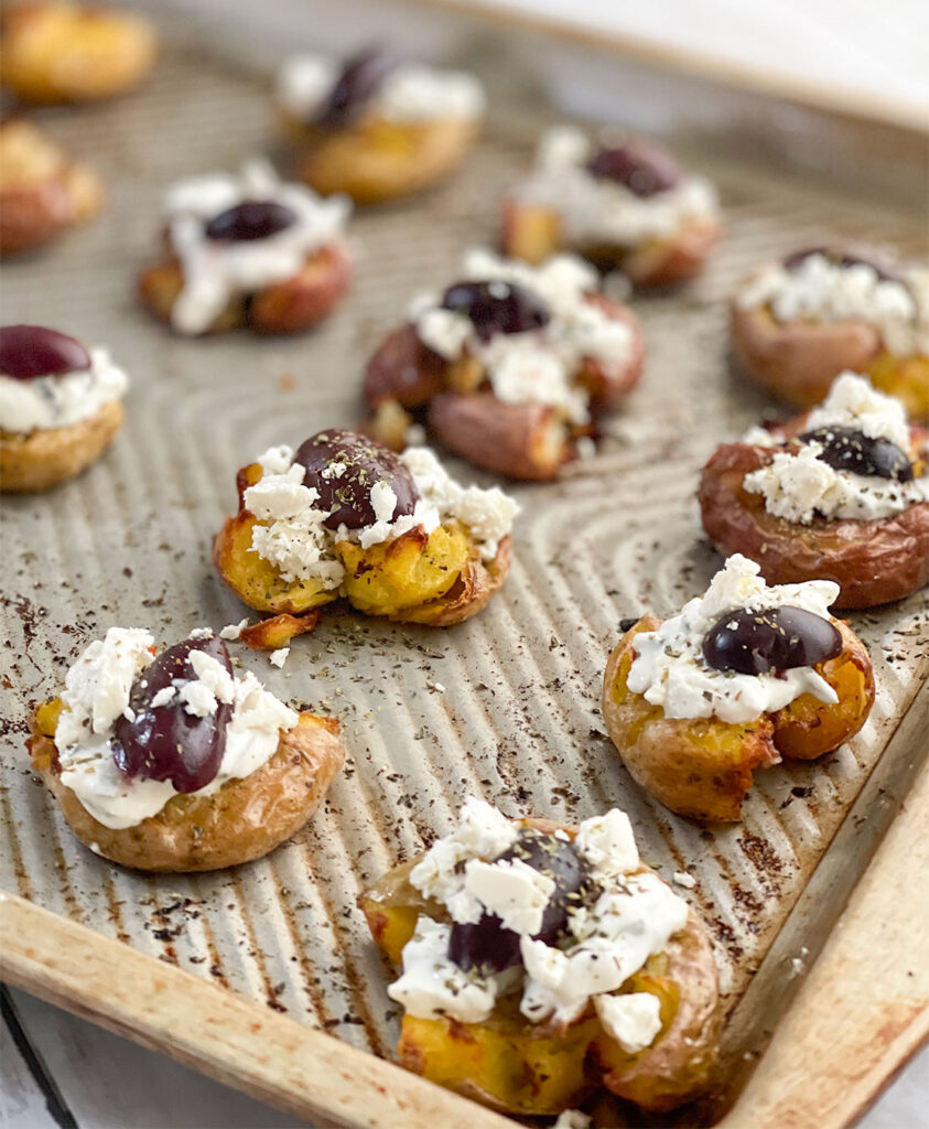 smashed potatoes, feta cheese, kalamata olive and dried oregano