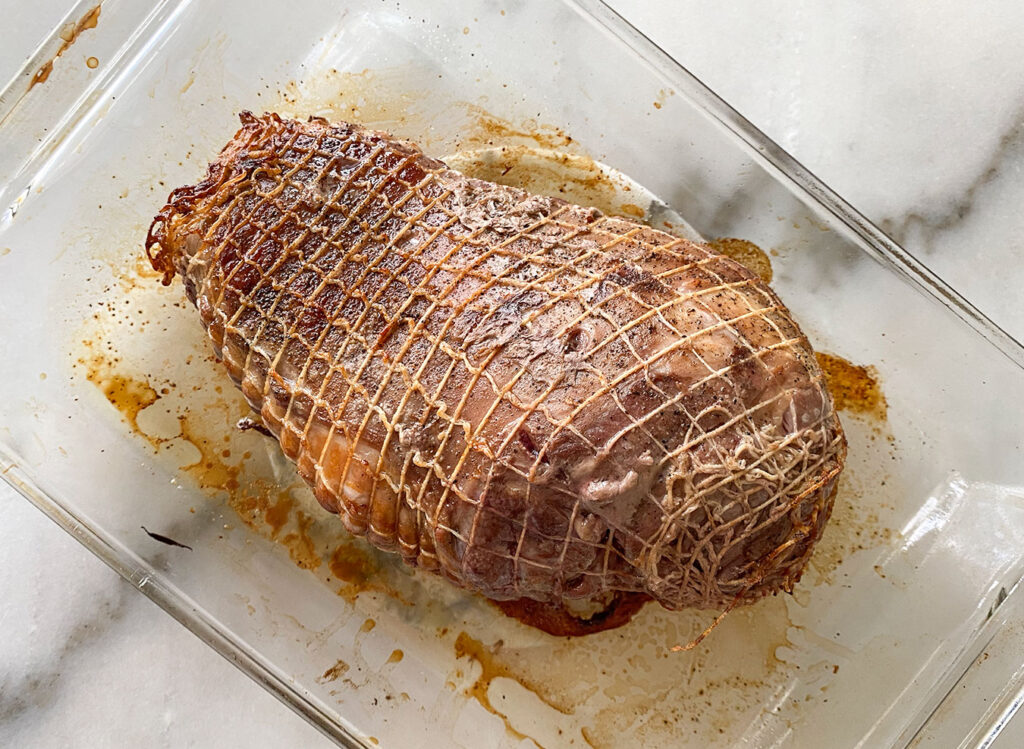leg of lamb after browning for 30 minutes in the oven
