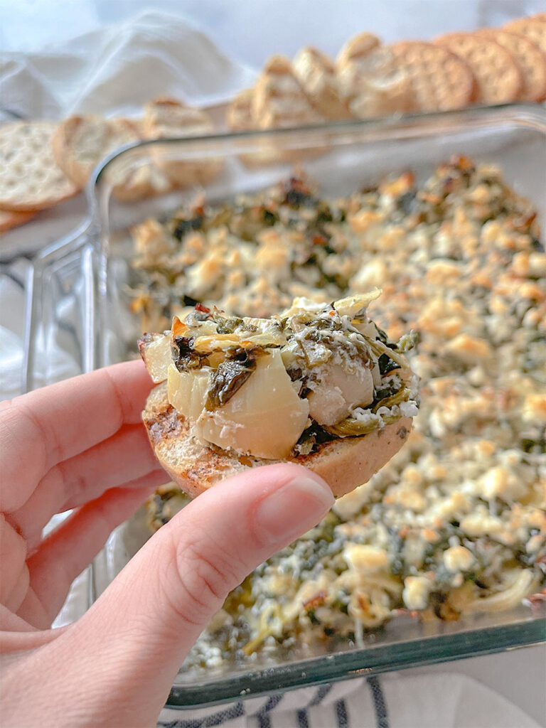 spinach artichoke feta dip on toast