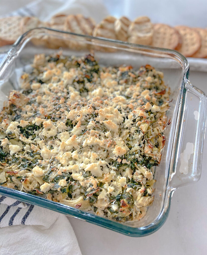 Spinach and artichoke dip topped with feta cheese