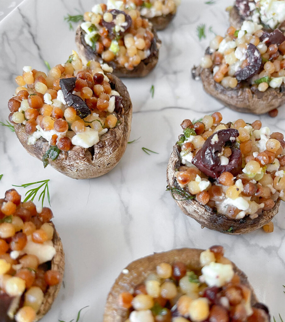 stuffed mushrooms on a serving dish