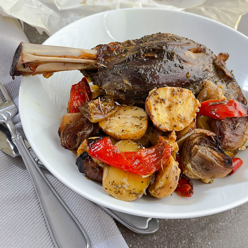 Oven roasted lamb shank with vegetables