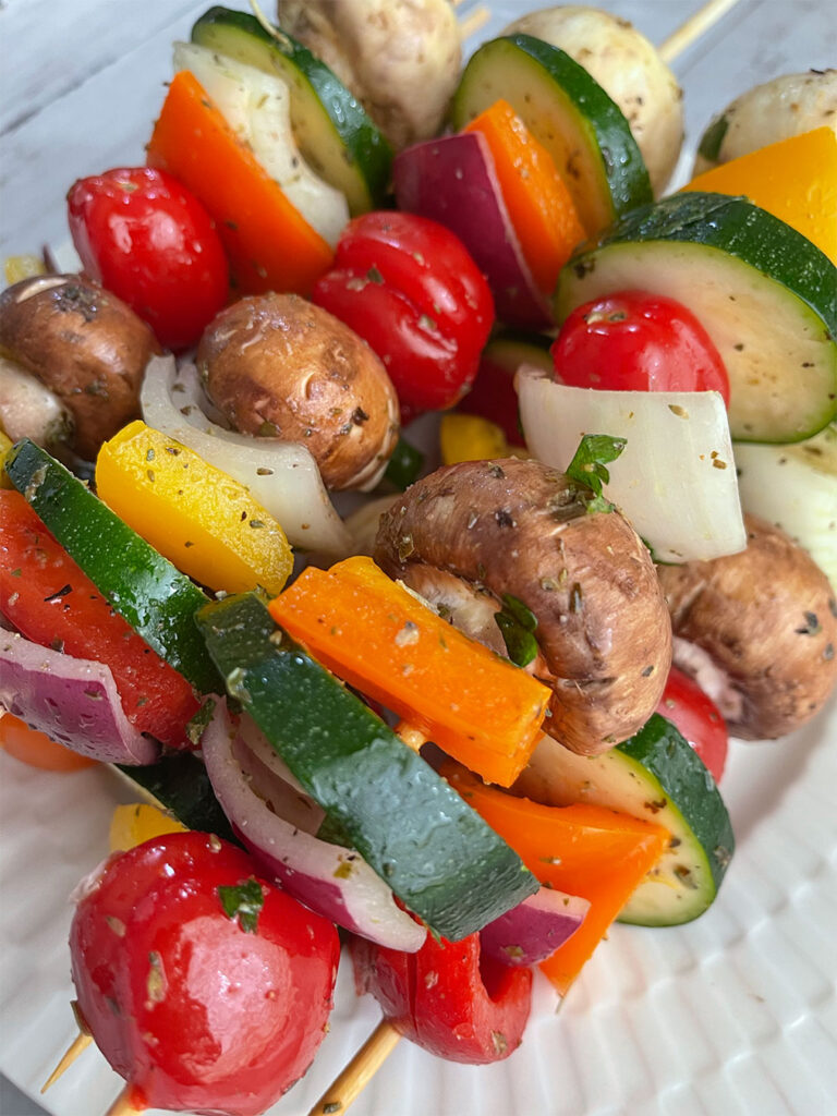 marinated vegetables on wooden skewers