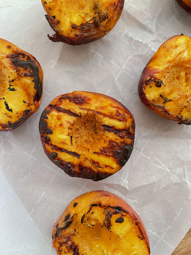 peach halves fresh off of the grill
