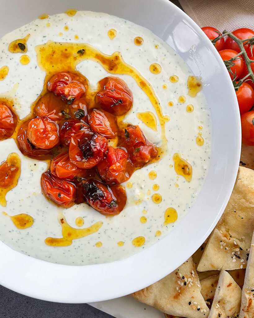 Creamy Whipped Feta with roasted tomatoes and grilled pita bread