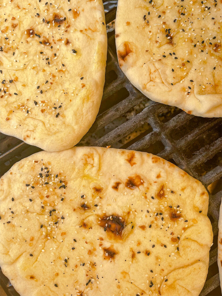 Grilling the naan bread