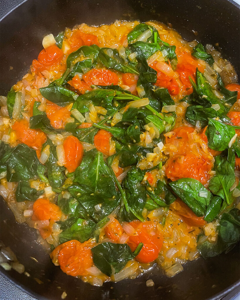 mixture of tomatoes, onions and spinach